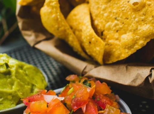 Creamy Guacamole Paired with Crunchy Nachos