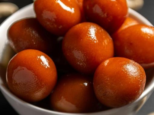 Indian Gulab Jamun Fried Milk Balls in Sugar Syrup