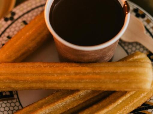 Spanish Churros Fried Dough with Sugar and Chocolate