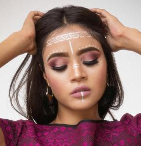 Contoured Face with Pale Violet Eyeshadow and Geometric Art